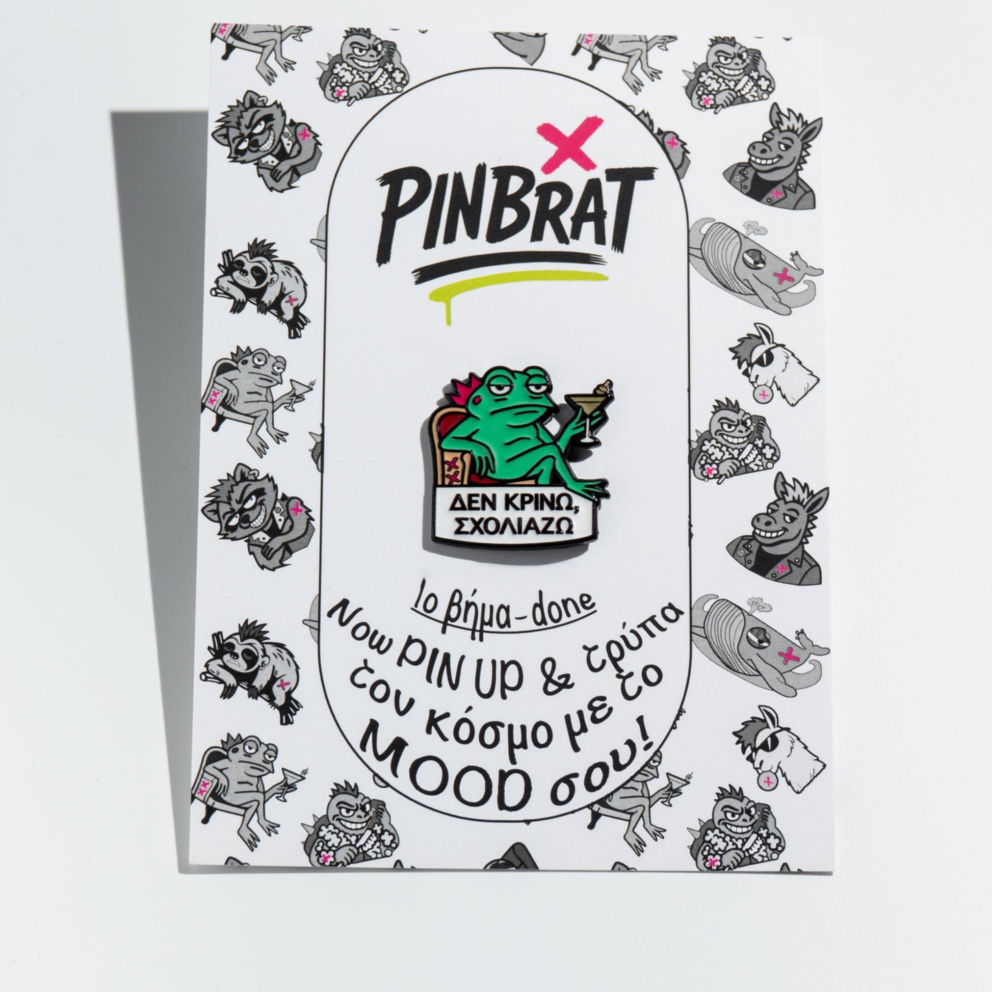 Pinbrat product packaging with a frog enamel pin design on a white background