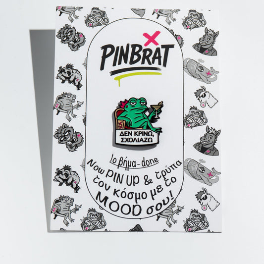 Pinbrat product packaging with a frog enamel pin design on a white background