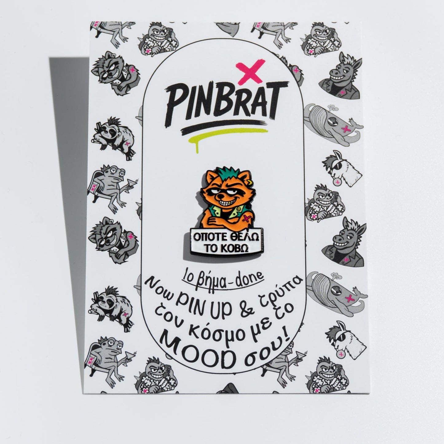 Pinbrat product packaging with cartoon raccoon design on a white background