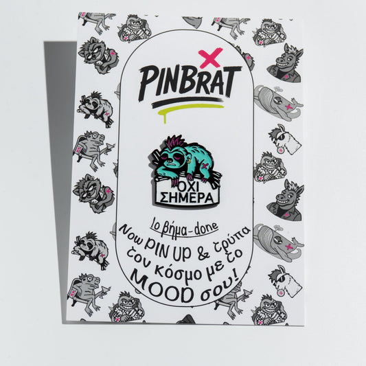 Product packaging with 'PINBRAT' branding and sloth enamel pin character on a white background